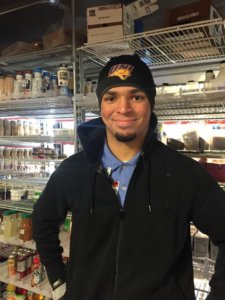 headshot of Romero Hill inside a Kwik Trip store