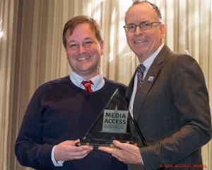 A&E's Drew Tappon & Born This Way Executive Producer Jonathan Murray posed with Murray's award
