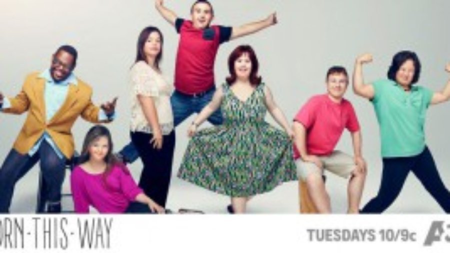 Image of cast facing camera and smiling, text on bottom says Born This Way is on A&E on Tuesdays at 10/9c