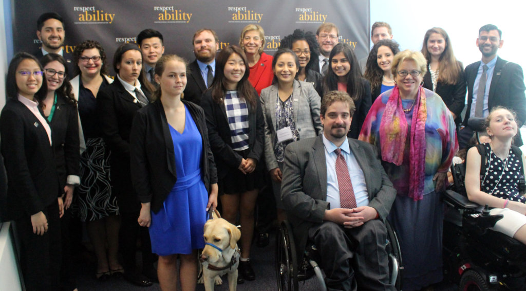 Celinda Lake and RespectAbility Fellows standing and seated in a posed photograph, smiling for the camera