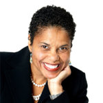 head shot of Donna Walton wearing a black suit and pearls