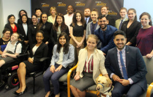 Gerard Robinson and RespectAbility Fellows standing and seated in a posed photograph, smiling for the camera