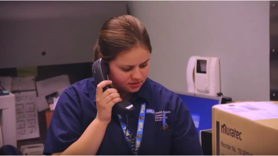 A young woman answering the phone