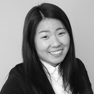 headshot of Ana Song wearing her hair loose grayscale photo