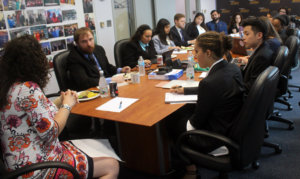 RespectAbility fellows are sitting around the table and listening to Dana Marlowe as she is talking