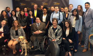 David Trone with Fellows sitting and standing around him