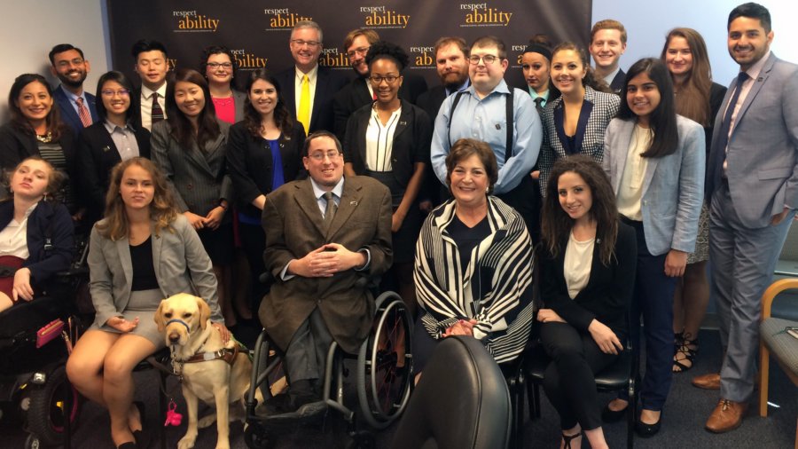 David Trone with Fellows sitting and standing around him