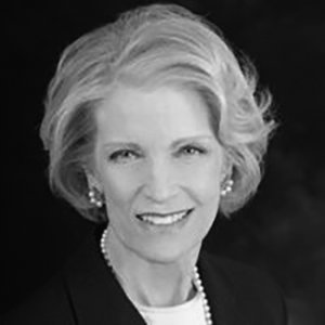 headshot of Dr. Dee Soder and she is wearing pearl earrings and a pearl necklace grayscale photo