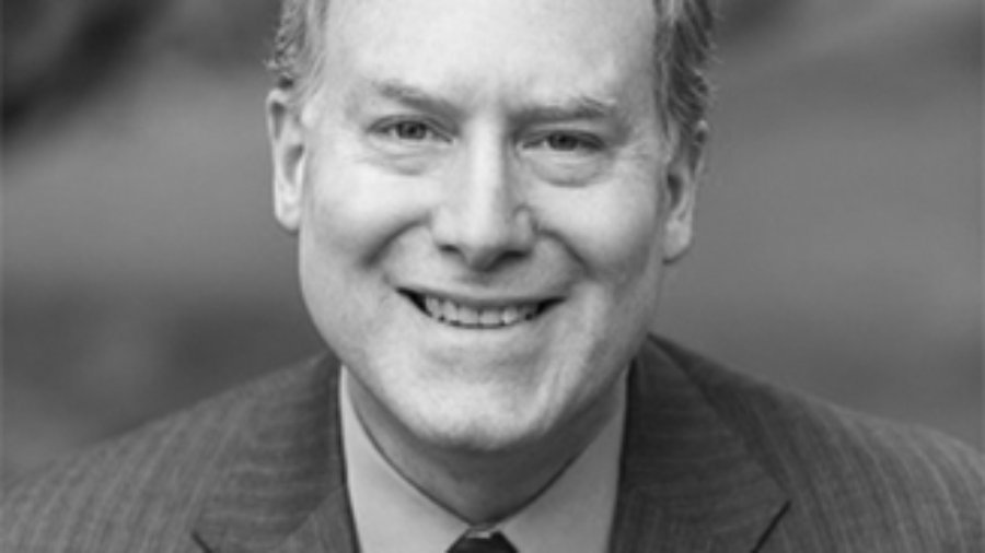 Donn Weinberg wearing a suit tie grayscale photo