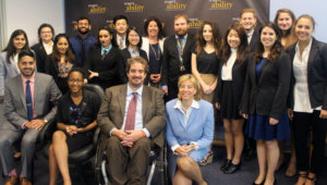 Fran Watson with Fellows sitting and standing around her