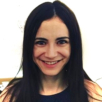 headshot of Gabrielle Einstein-Sim smiling and facing the camera wearing a tank top color photo