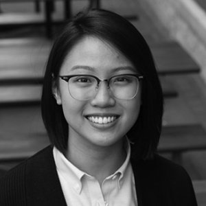 headshot of Judith Lao wearing glasses grayscale photo