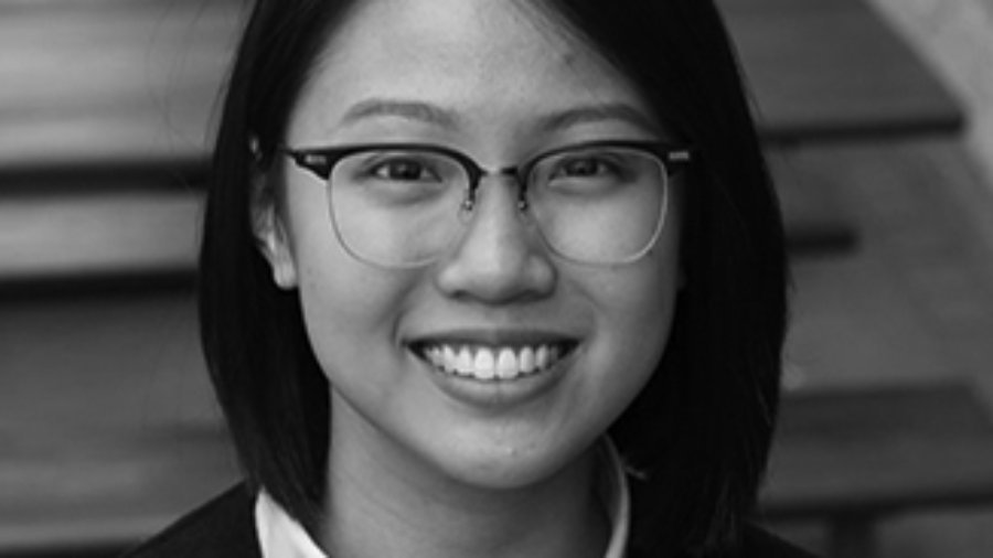 headshot of Judith Lao wearing glasses grayscale photo