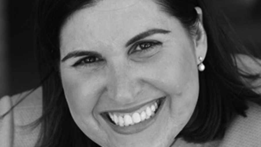 headshot of Lauren Appelbaum smiling and wearing a blazer grayscale photo