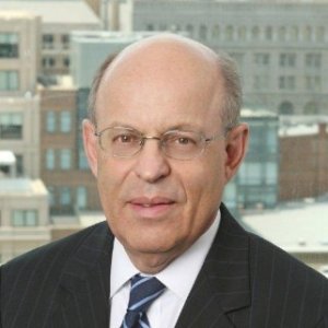 headshot of Ronald Glancz wearing glasses and a striped tie color photo