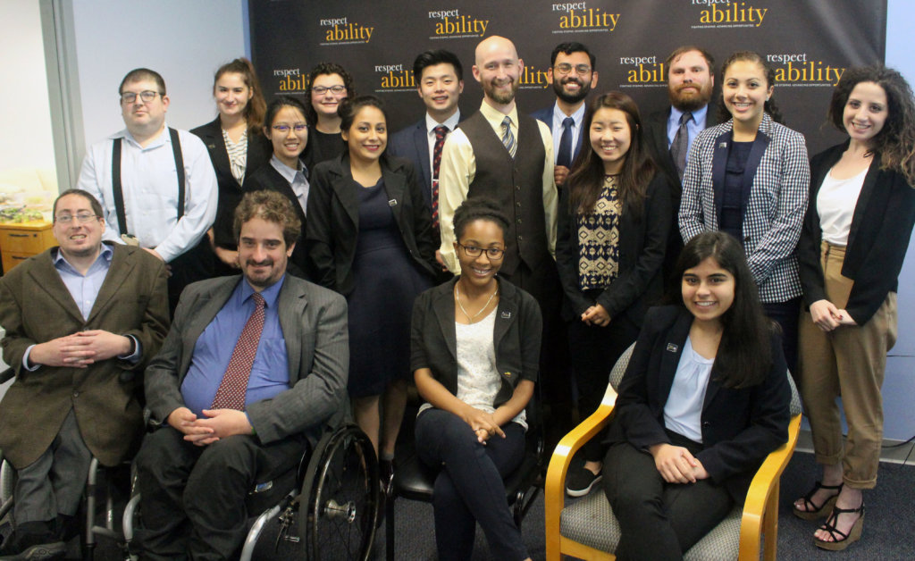 Michael Murray with Fellows sitting and standing around him