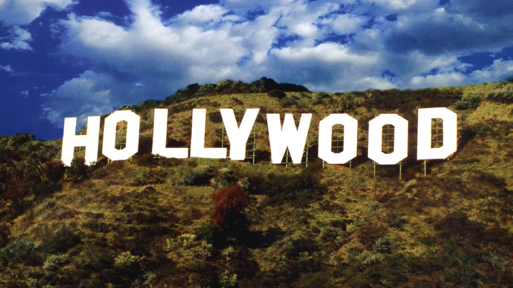 letters spelling out Hollywood on top of a mountain with trees