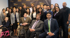 All of the fellows and staff standing in a large group against the wall with the RespectAbility logo all over it