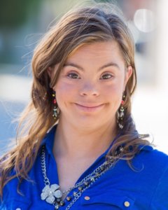 headshot of Cristina Sanz wearing a blue top