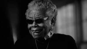 black and white photo of Maya Angelou wearing sunglasses