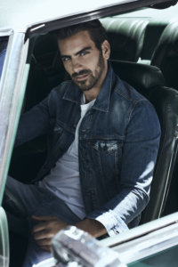 Nyle DiMarco sitting in a car