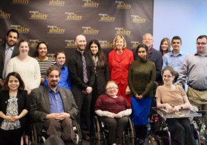 Michael Murray and RespectAbility Spring 2018 Fellows in front of the RespectAbility banner