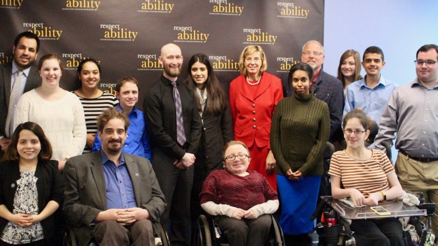 Michael Murray and RespectAbility Spring 2018 Fellows in front of the RespectAbility banner