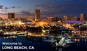 Photo of downtown Long Beach at night with the text "Welcome to Long Beach, CA" in the bottom left.