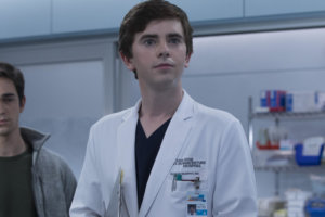 Freddie Highmore as Dr. Shaun Murphy in a labcoat