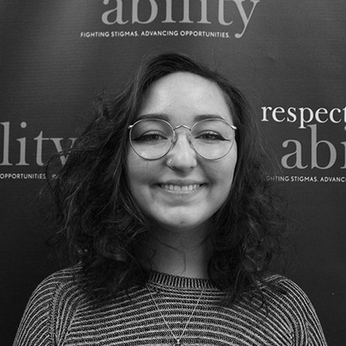 Headshot of Rachael Walloga in front of the Respectability banner