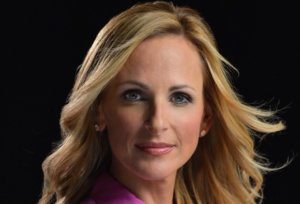 headshot of Marlee Matlin wearing a pink top