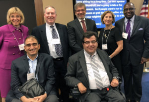 Jennifer Mizrahi, Rodney Hood, Shelley Cohen, Donn Weinberg, Jim Sinocchi, Ron Painter and Vincenzo Piscopo smile for a group photo