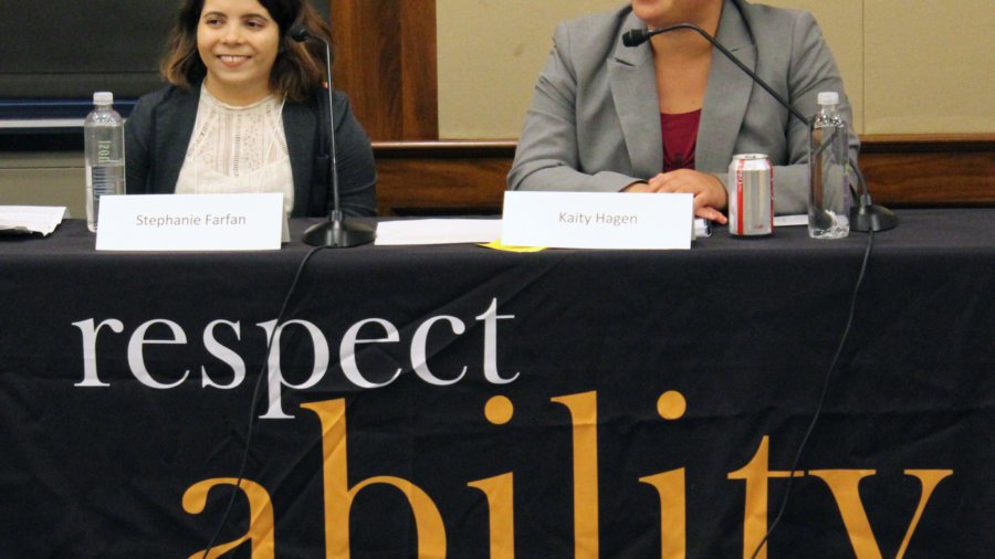 Stephanie Farfan and Kaity Hagen behind a table with the respectability logo on it