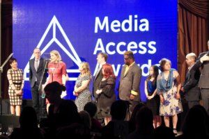 Jonathan Murray and the Born This Way cast present an award to Sasha Alpert and Megan Sleeper at the Media Access Awards 2018