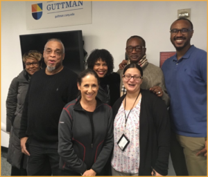 Presenters, facilitators, and partners at intersectional empowerment event smiling together