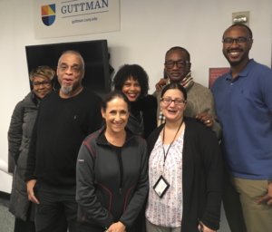 Presenters, facilitators, and partners at intersectional empowerment event smiling together