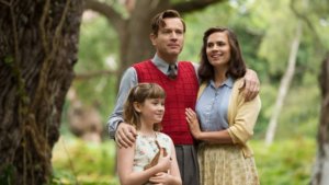still from Christopher Robin movie showing parents and daughter