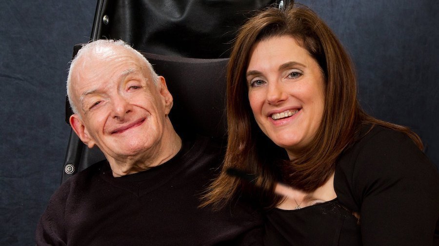 Guila Franklin Siegel and her father smiling together