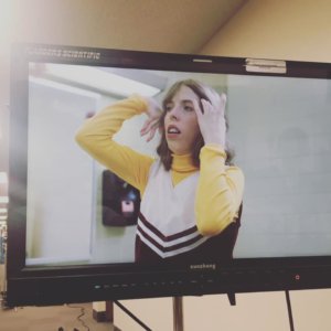 Emily Kranking on a monitor in wardrobe for The Homecoming