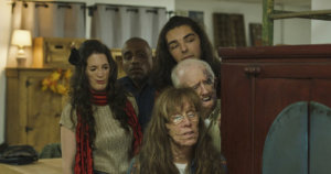 Still from the movie Happy Face with five actors looking at something off camera