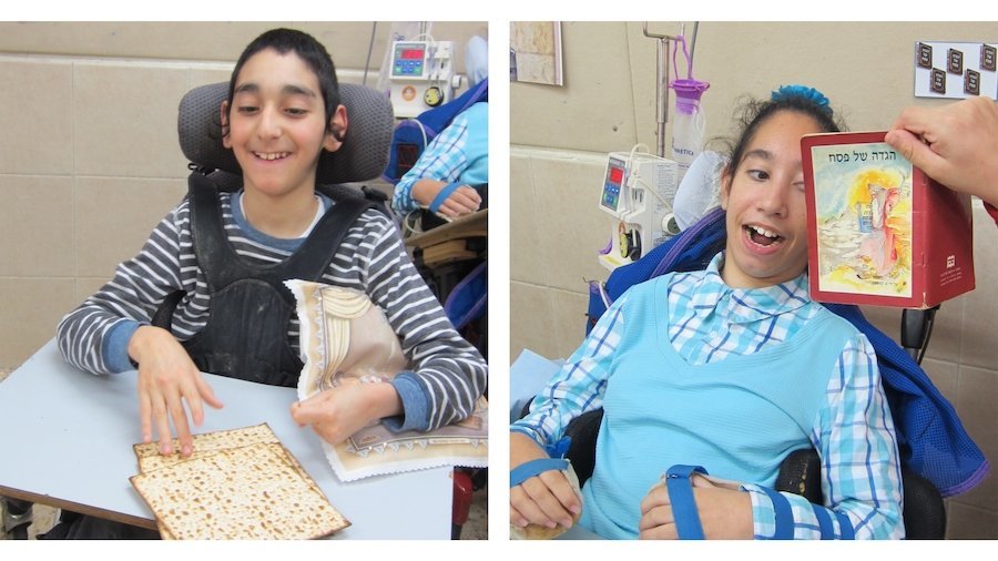 Two children with disabilities. One eating matzah and one looking at a Haggadah