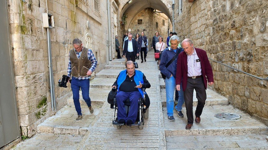 A wheelchair user tries out the newly accessible streets in Jerusalem's Old City, part of a NIS 20 million ($5.5 million) project along four kilometers of Old City streets