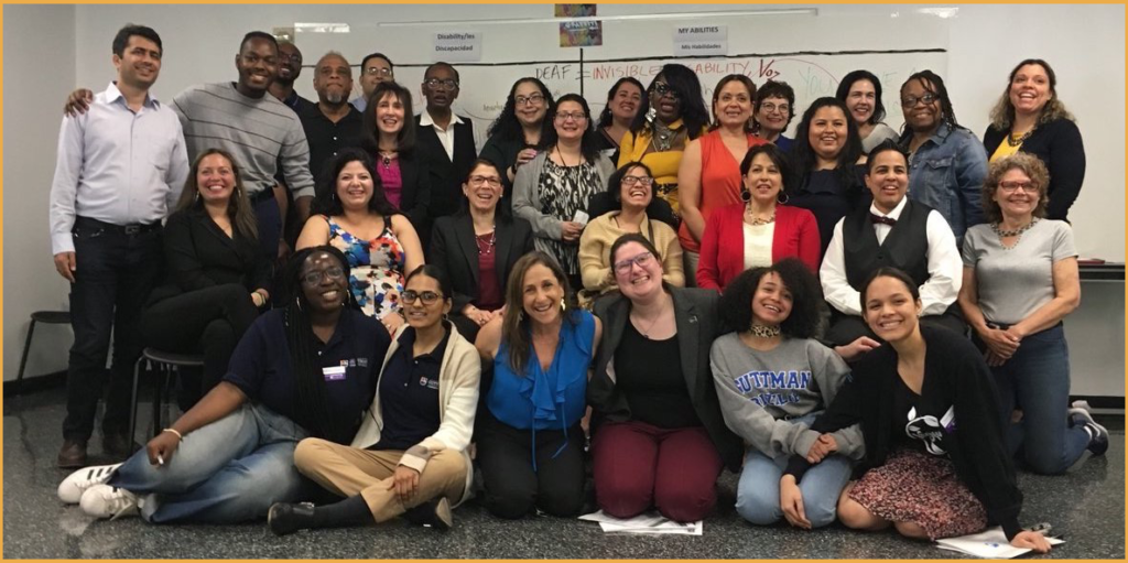 Attendees at training for latinas with disabilities smiling together
