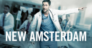 New Amsterdam key art with Ryan Eggold as Dr. Max Goodwin in scrubs walking down a hallway with other doctors in the background