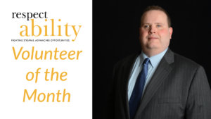 Gary Norman smiling wearing a suit and tie in front of a black background Text: RespectAbility Volunteer of the Month.