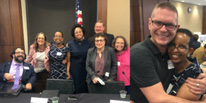 Photos of RespectAbility's Self Advocacy Panelists, including Laka Mitiku Negassa, together behind a table and Laka Mitiku Negassa hugging a man who helped her recover from her brain injury at RespectAbility's 2019 summit