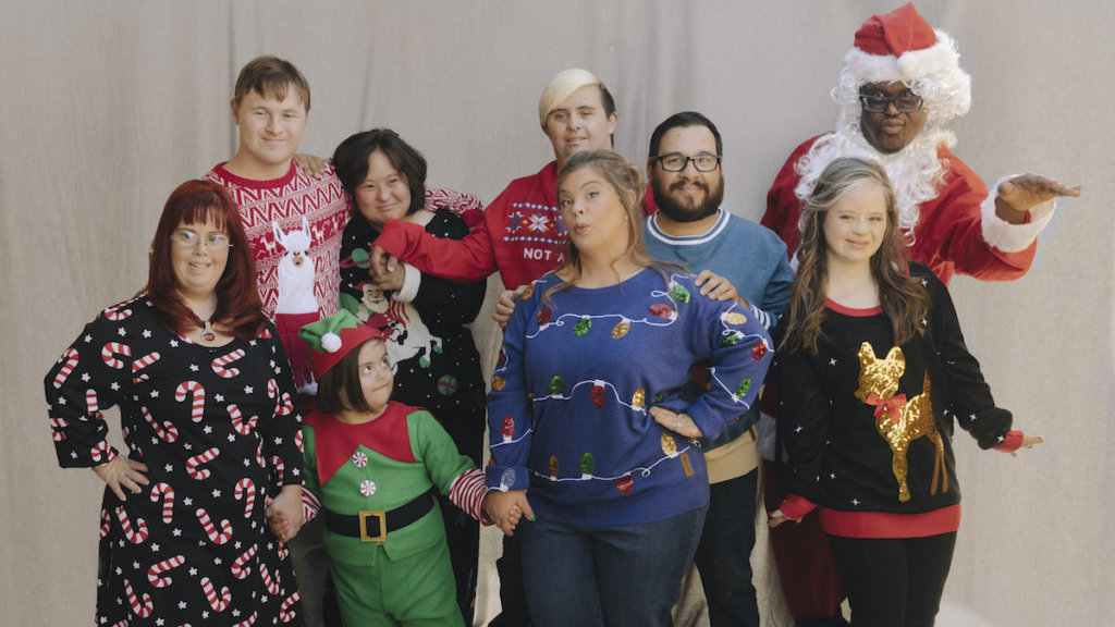 The cast of Born This Way together in festive clothes