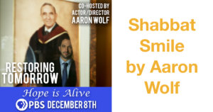 Text: Shabbat Smile by Aaron Wolf Co-hosted by Actor/Director Aaron Wolf Restoring Tomorrow Hope is Alive PBS December 8th. A portrait in an art gallery with a man reflected in the glass