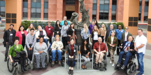 diverse group of summer lab participants with disabilities posing for photo on Walt Disney lot