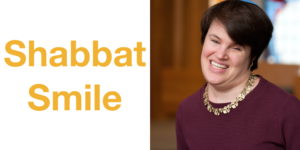Rabbi Lauren Tuchman smiling headshot. Text: Shabbat Smile